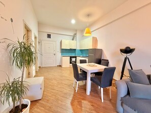 Deluxe Apartment, Balcony, City View | Living area - Orange Central Suites (Budva)