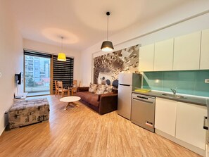 Superior Apartment, Balcony, City View | Living area | 42-inch LCD TV with cable channels - Orange Central Suites (Budva)
