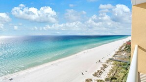 A beach with a clear sky and a view of the ocean. - Majestic Beach Towers 1-1314 (Panama City Beach)