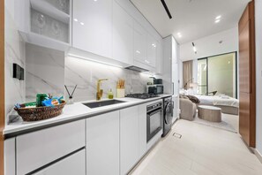 Microwave, oven, stovetop, coffee/tea maker - Brand New Luxury Studio | Amazing Pool & Gym (Dubai)
