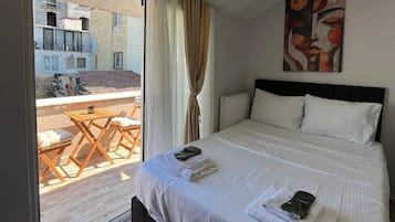 Deluxe Loft, City View | In-room safe, blackout drapes, soundproofing, iron/ironing board