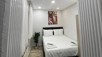 Standard Room | In-room safe, blackout curtains, soundproofing, iron/ironing board