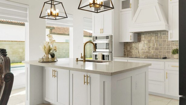 Una cucina moderna con mobili bianchi, un'isola centrale, elettrodomestici in acciaio inossidabile e un backsplash geometrico.