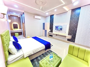 Deluxe Room | Desk, laptop workspace, blackout drapes, soundproofing - Tiger Heaven Resort (Manpur)