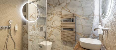 Shower, free toiletries, hair dryer, towels