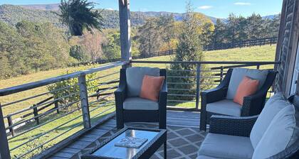 Romantic Couples Getaway | Rustic Post & Beam Cabin with Mountain Views Escape to this immaculate post-and-beam cabin nestled on 42 peaceful acres of rolling pasture and cedar forest — perfect for a romantic retreat!