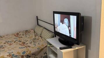 Fer et planche Ă repasser, draps fournis