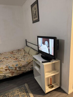 Fer et planche à repasser, draps fournis