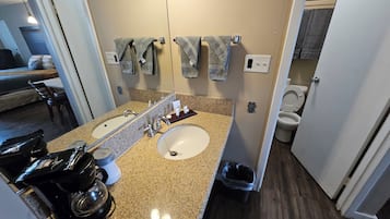 Superior Studio Suite, Non Smoking, Refrigerator & Microwave | Bathroom | Combined shower/bathtub, eco-friendly toiletries, towels, soap