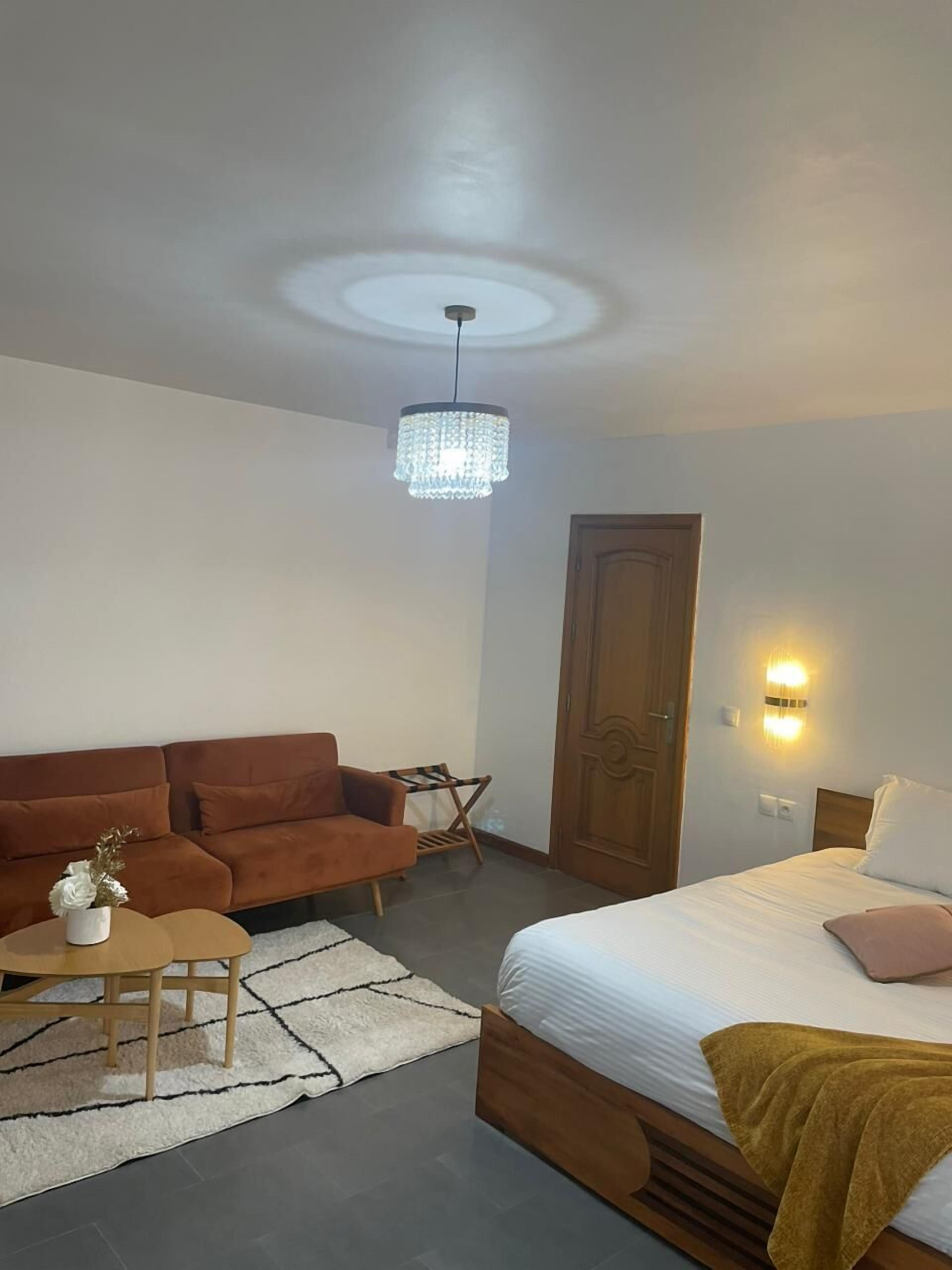 Deluxe Room, Garden View | In-room safe, iron/ironing board, free WiFi, bed sheets