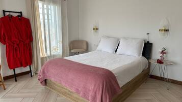 Classic Double Room, Garden View | In-room safe, iron/ironing board, free WiFi