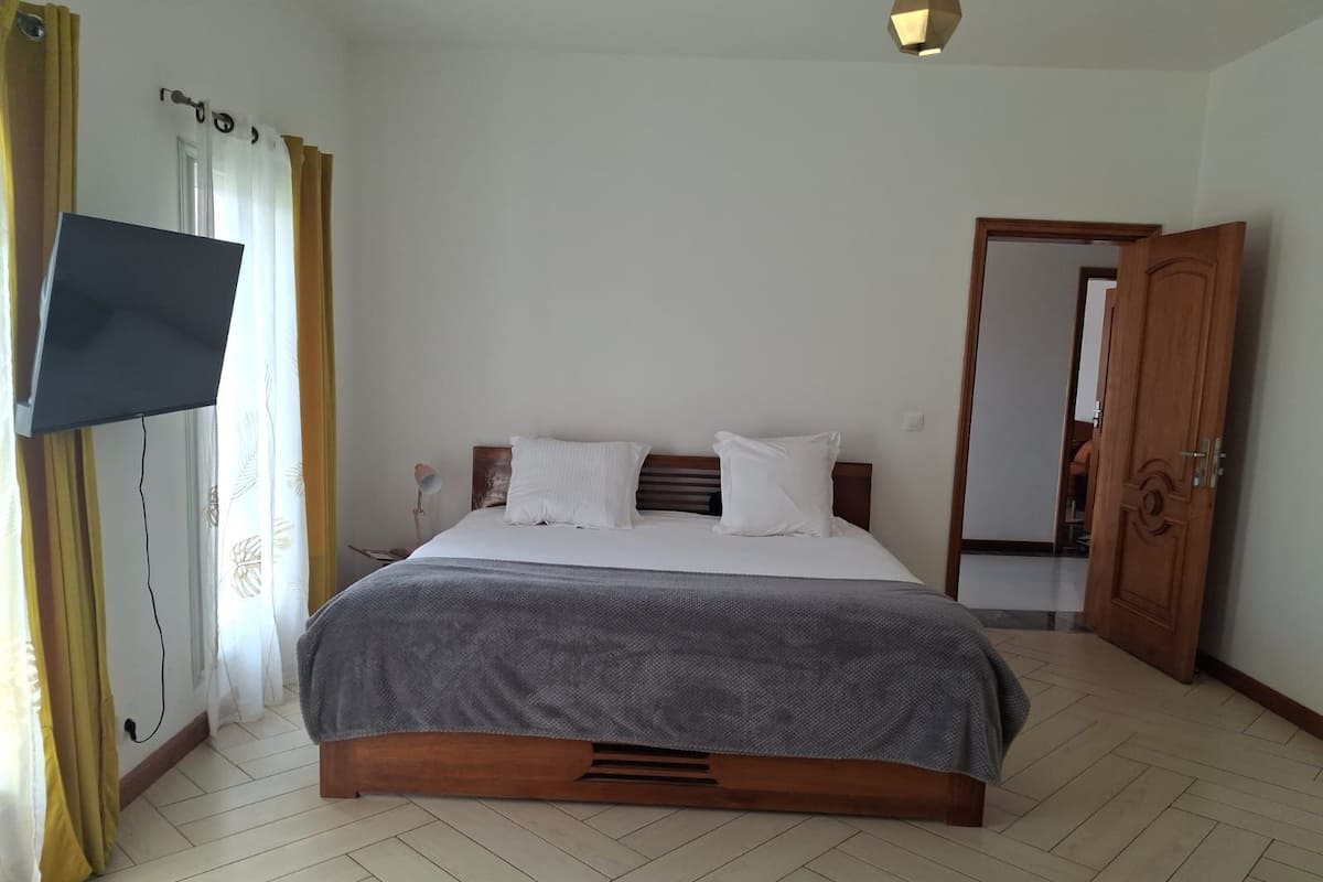 Family Room, Garden View | In-room safe, iron/ironing board, free WiFi, bed sheets