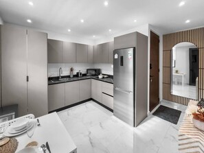 Cook Comfortably in a Sleek, Contemporary Kitchen - Hyde Park #9 | Cozy Couples Apt @ San Juan (San Juan de Puerto Rico)