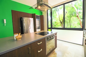 Superior Duplex, Multiple Beds, Balcony, Garden View | Private kitchen | Espresso maker, dining tables, kitchen islands - Mi Querido Tulum Apt with Pool-View (Tulum)