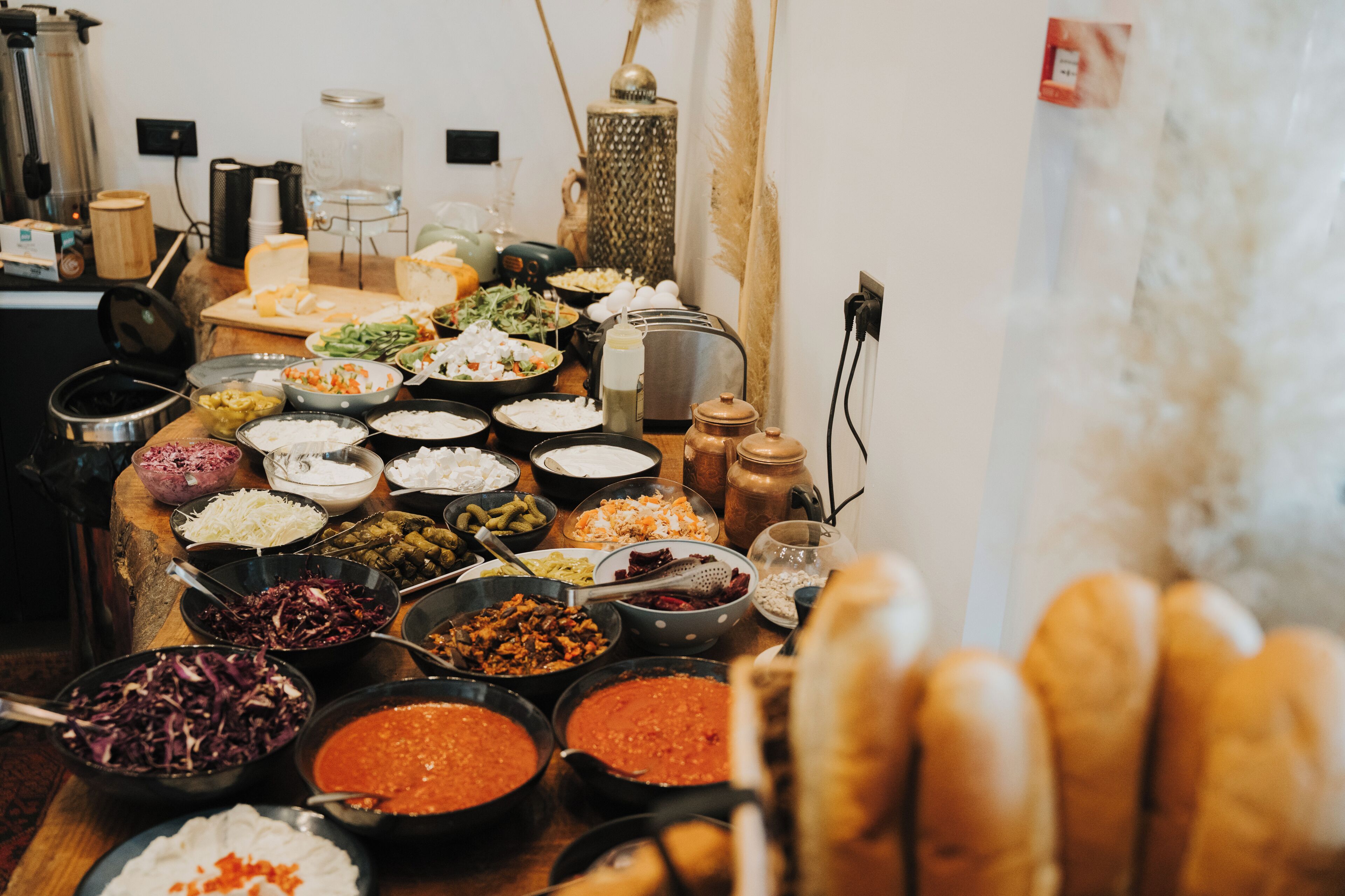 A table with various food items and condiments.