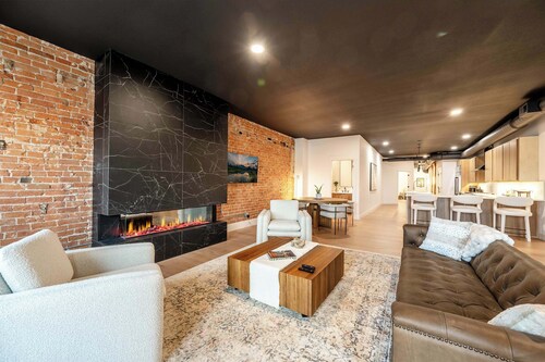 Onyx | Luxury Executive Loft Overlooking Main | Vibrant Fireplaces, King Bed