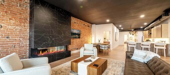 Onyx | Luxury Executive Loft Overlooking Main | Vibrant Fireplaces, King Bed
