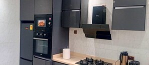 Apartment, 3 Bedrooms, Air conditioning, Ground Floor | Private kitchen - SNS Apartments (Adentan)
