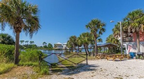 Property grounds - 1-Bedroom Salty Escape Condo with pool and Lagoon view with boat launch and dock (Gulf Shores)