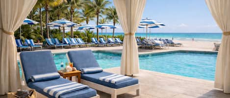 2 outdoor pools, pool umbrellas, pool loungers