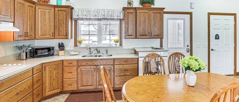 Fridge, microwave, stovetop, coffee/tea maker