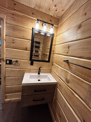 Shower, hair dryer, towels, toilet paper