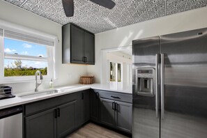 Fridge, microwave, oven, stovetop - Serenity on Bayshore • Pool,Pier & Game/Movie Room (Seminole)