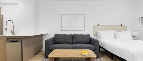 Estudio Deluxe | Área de sala de estar