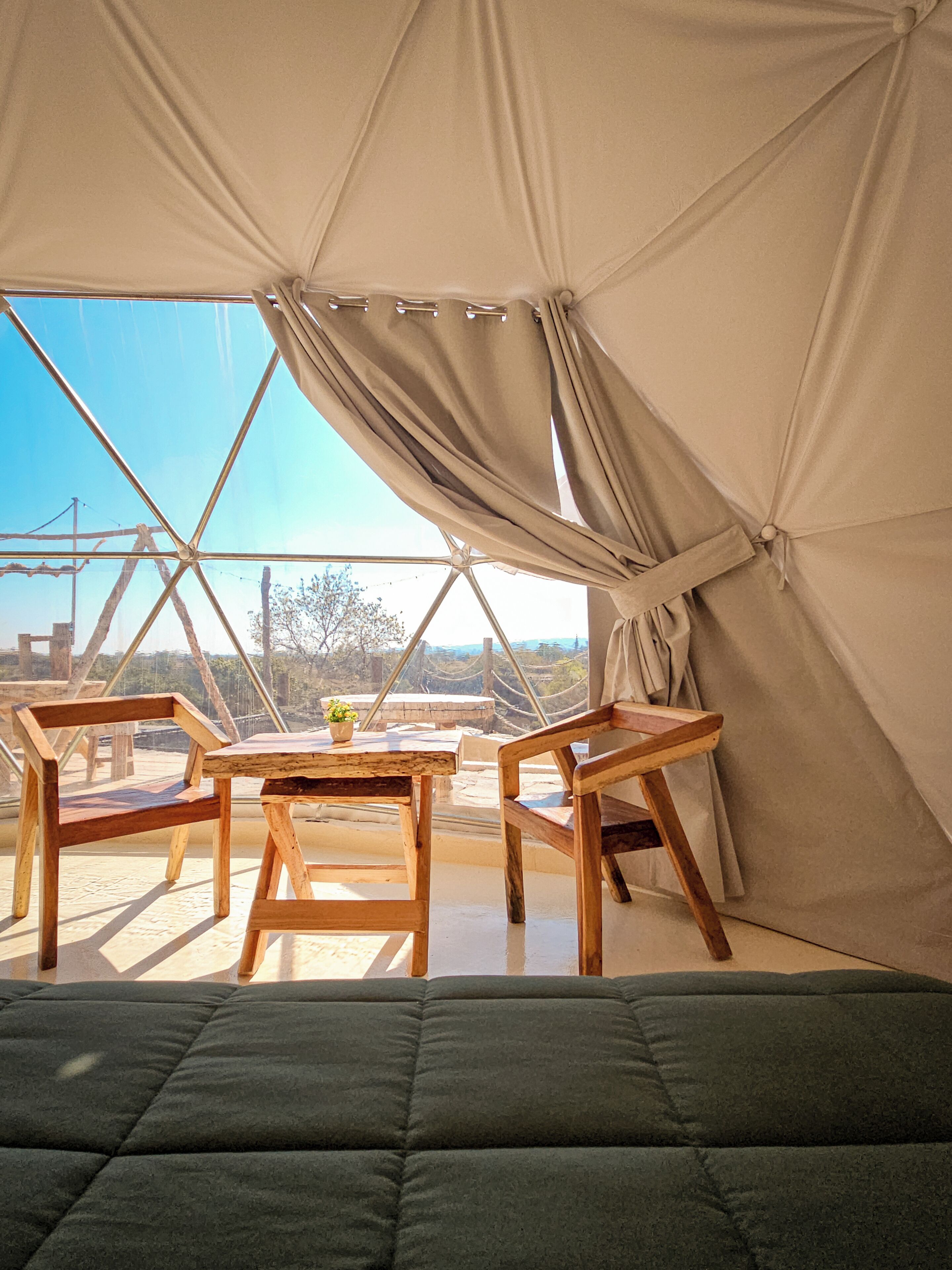 Deluxe Quadruple Room, Patio, Garden View | Living area