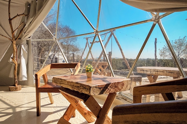 Deluxe Quadruple Room, Patio, Garden View | Living area