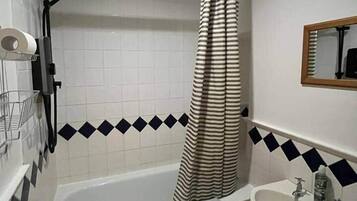 Hair dryer, towels, soap, toilet paper