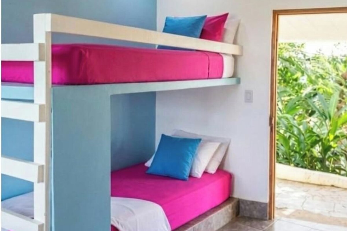 Economy Quadruple, private bathroom, fan, and ocean view | WiFi (free), bed sheets