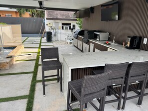 Terrace/patio - Welcome to Your Luxurious Retreat With A Resort Style outdoor Kitchen and pool! (Miami)