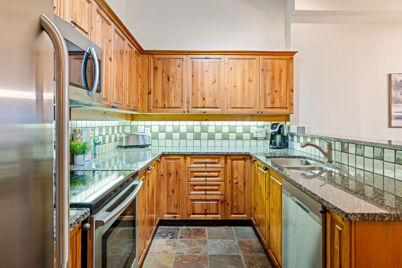 Microwave, stovetop, dishwasher, dining tables
