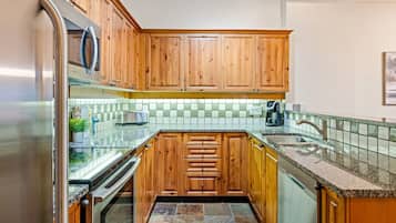 Microwave, stovetop, dishwasher, dining tables