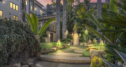 Tropical 2BR Retreat • Walk to Beach + Large Deck