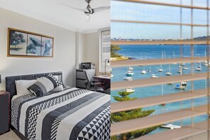 2 habitaciones, tabla de planchar con plancha y ropa de cama 