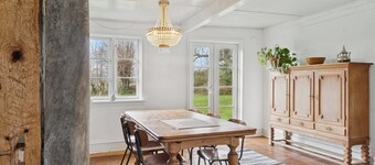 Idyllic 1857 farmhouse in Langelands nature