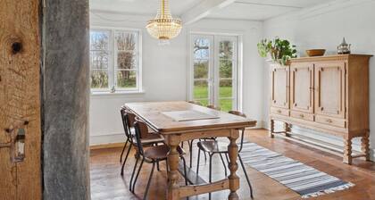 Idyllic 1857 farmhouse in Langelands nature