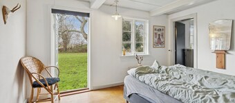 Idyllic 1857 farmhouse in Langelands nature