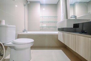 Standard Studio, 1 Bedroom | Bathroom | Separate tub and shower - Fully Furnished Studio With Comfortable Design Azalea Suites Apartment (Cikarang)