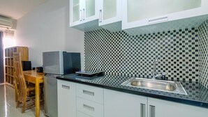 Standard Studio, 1 Bedroom | Private kitchen - Homey And Cozy Studio At Park View Condominium Apartment (Depok)