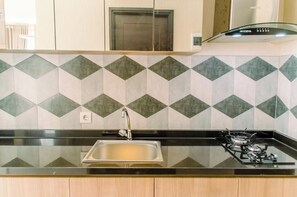 Standard Studio, 1 Bedroom | Private kitchen - Warm And Comfort Studio At Casa De Parco Apartment (Pagedangan)