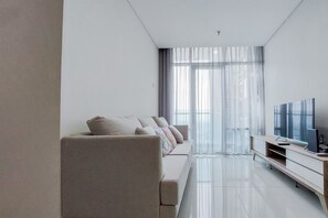 Departamento estándar, 2 habitaciones | Área de sala de estar