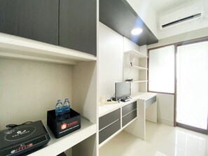 Standard Studio, 1 Bedroom | Private kitchen - Homey Studio At Lrt City Jatibening Apartment (Bekasi)