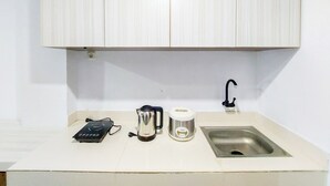 Unclassified image, 5 of 17, button - Homey Studio Apartment At Mansyur Residence (Medan)
