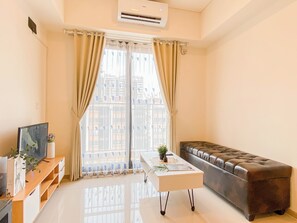 Standard Apartment, 2 Bedrooms | Living area - Cozy And Trendy 2Br Apartment Meikarta (Cikarang)