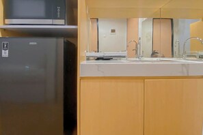 Standard Studio, 1 Bedroom | Private kitchen - Standard Studio At The Alton Apartment (Semarang)