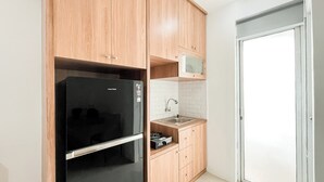 Standard Studio, 1 Bedroom | Private kitchen - Strategic And Trendy Studio At Bassura City Apartment (Jakarta)