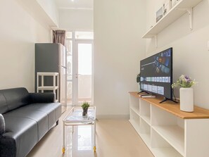 Standard Apartment, 2 Bedrooms | Living area - Enjoy Living 2Br At Vasanta Innopark Apartment (Cikarang)